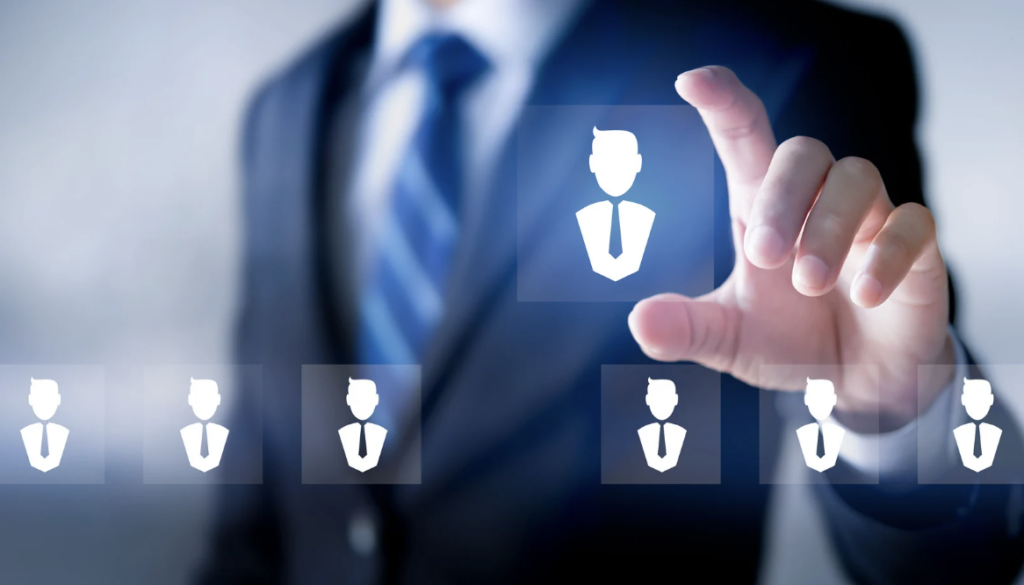 A business professional selecting a manager icon from a row of similar icons, symbolizing the importance of manager selection in decision-making processes.